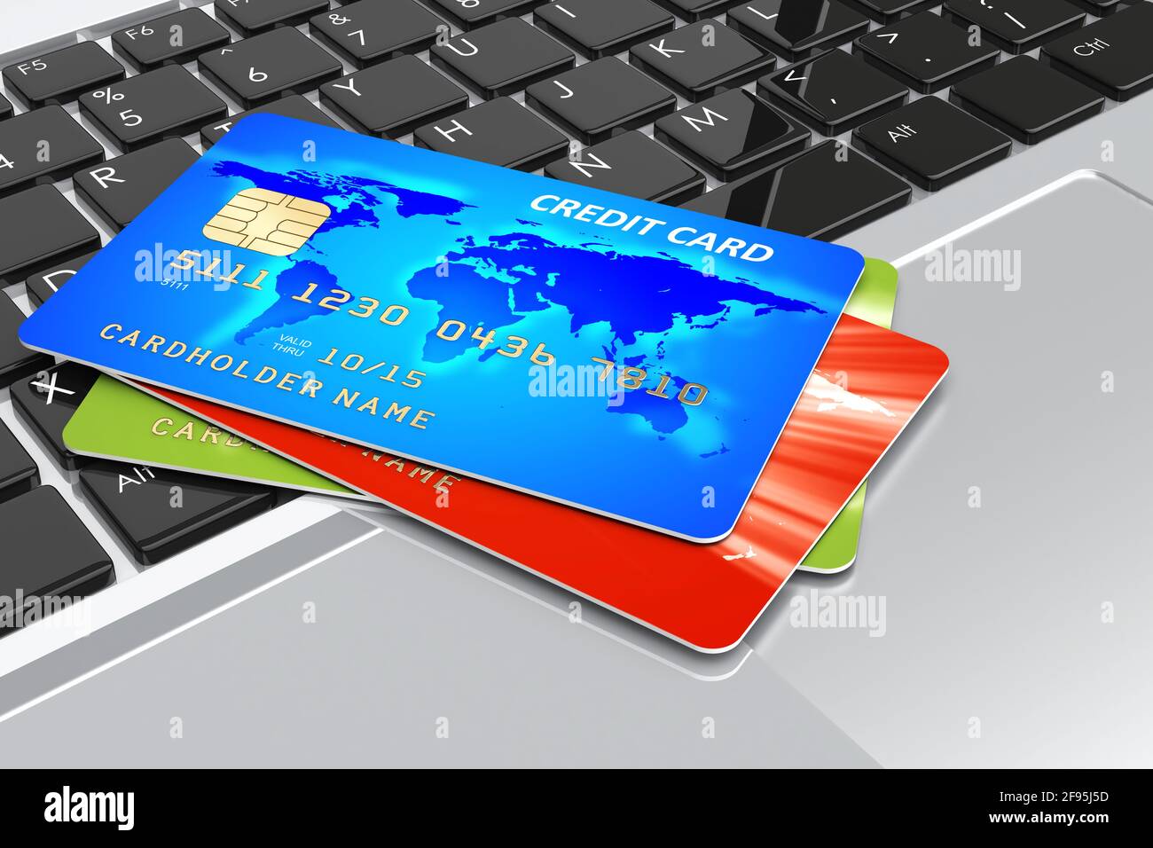 Credit cards on laptop keyboard. Internet shopping and e-commerce concept Stock Photo