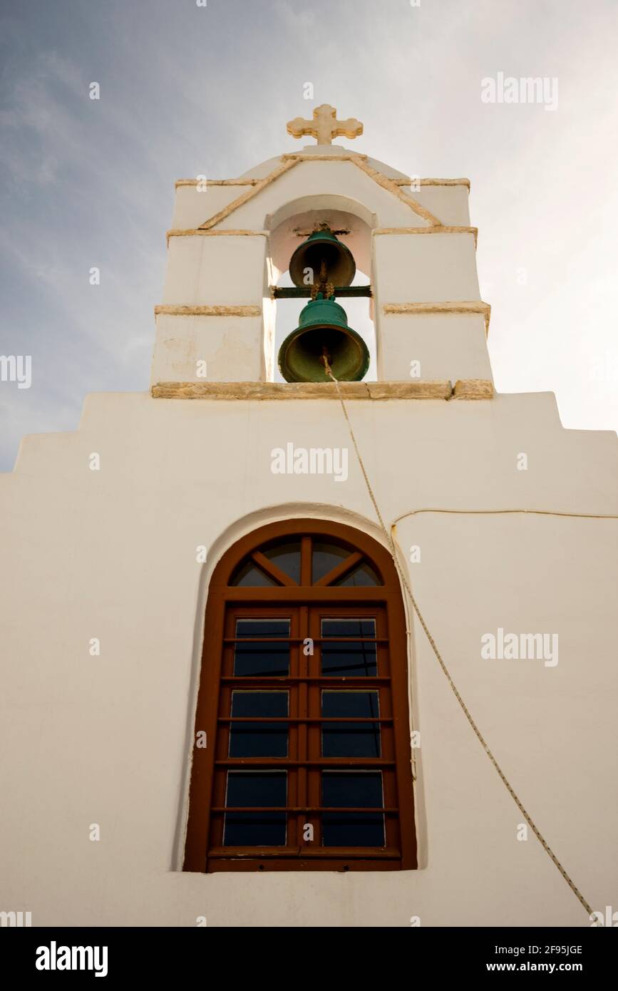 Two bell tower and stepped gable of a Christian church on the Greek Island of Mykonos. Stock Photo