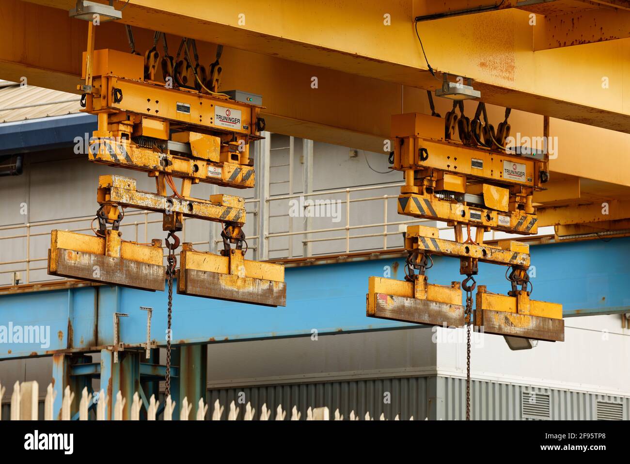 Steel lifting crane grabs. Lifting equipment. Heavy lifting machinery