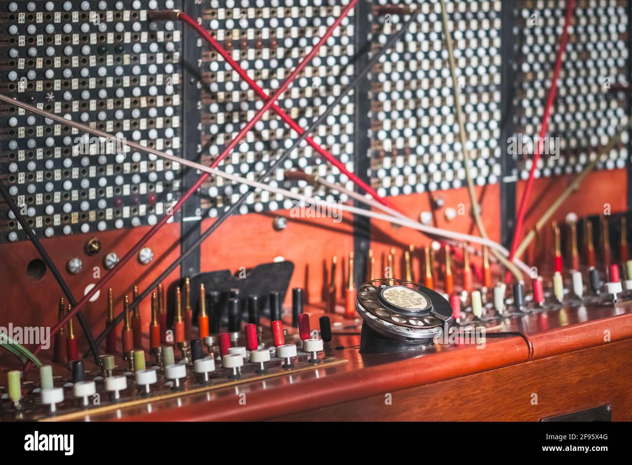 Old fashioned manual telephone exchange switchboard displayed at