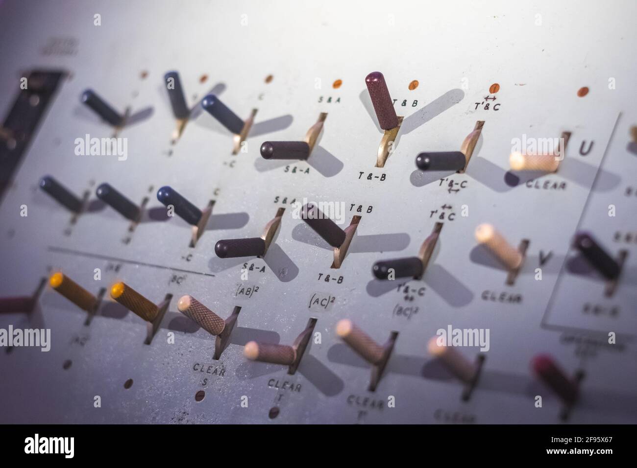 Toggle switches on a control panel of electrical logic machine ...