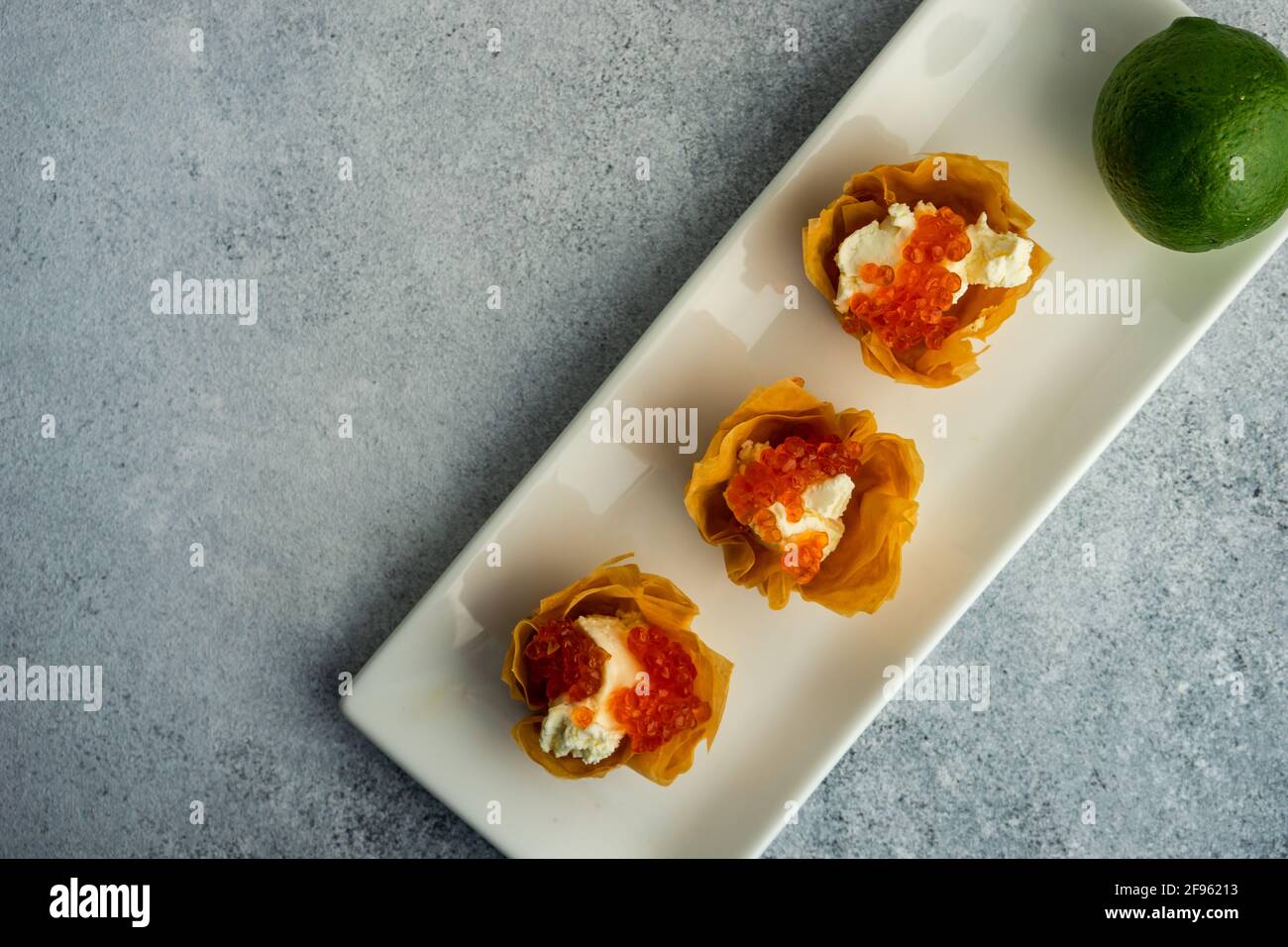 Finger food for lunch with cream cheese and red caviar Stock Photo Alamy