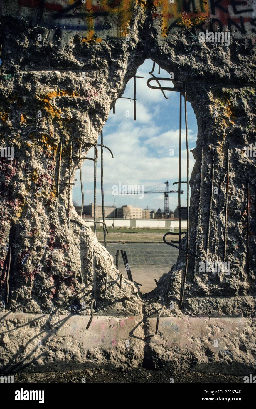 The end of East Germany: a hole in the Berlin Wall shortly after the opening of the wall in spring of 1990. Stock Photo