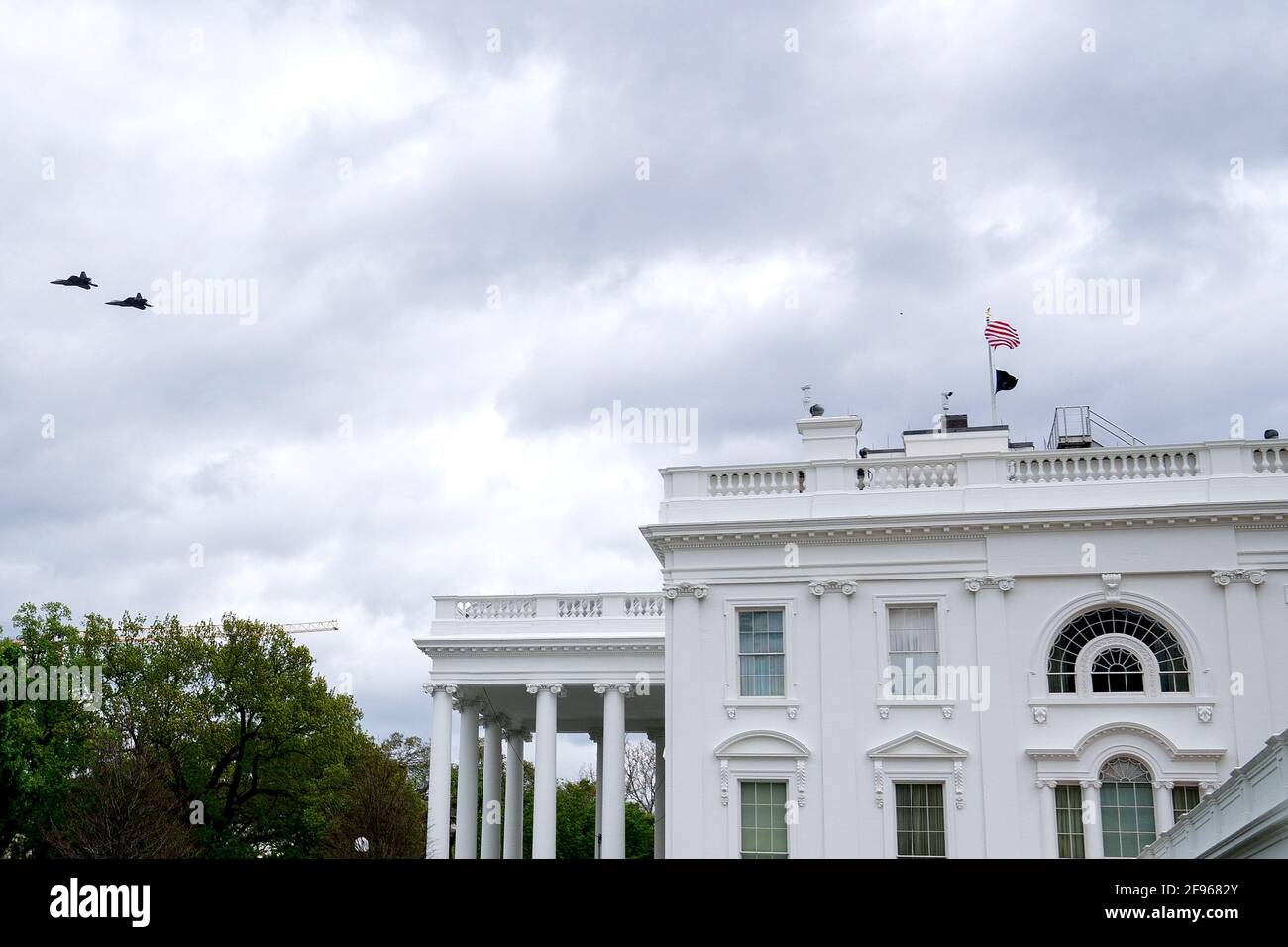 Military aircraft fly over the White House in Washington, DC, U.S., on