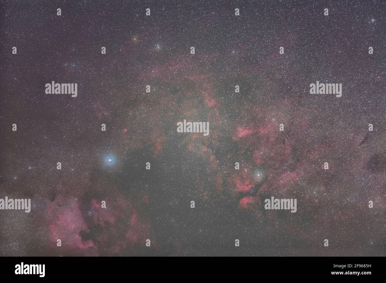 The region around the stars Deneb and Sadr in the constellation Swan with the North American Nebula and other strong nebula regions. Stock Photo