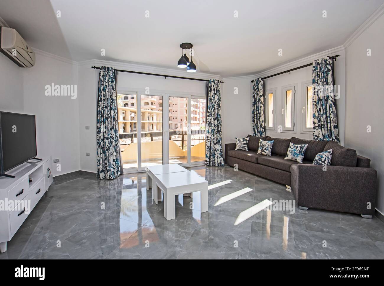 Picture of Living room lounge area in luxury apartment show home showing interior ...