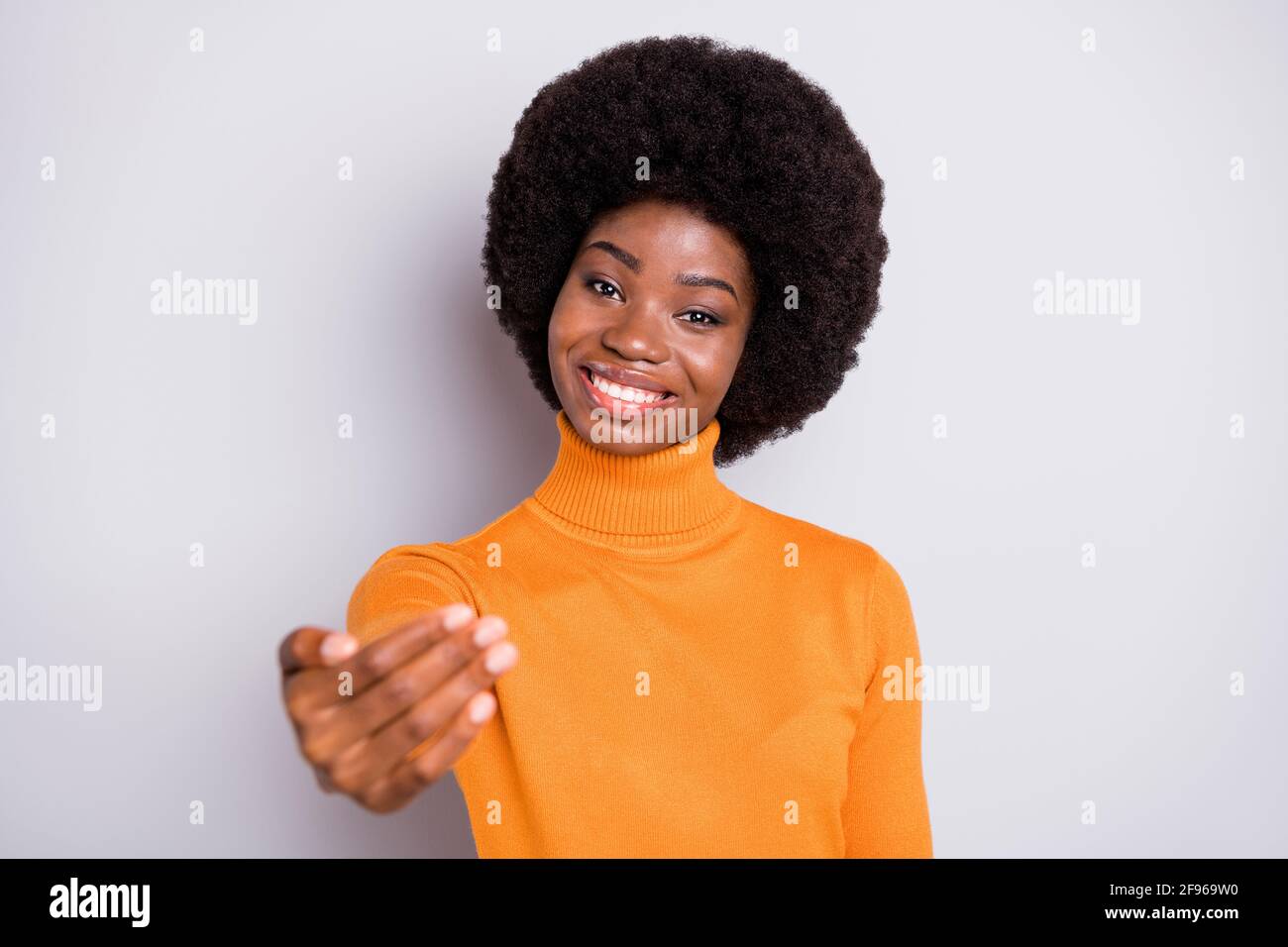 Photo of young attractive afro woman happy positive smile show hand ...