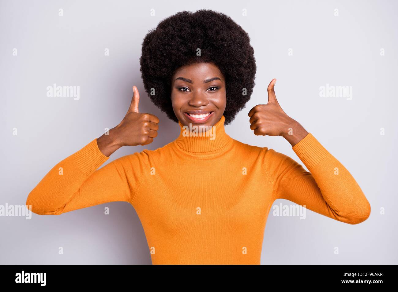 Photo of young attractive afro woman happy positive smile show thumb-up ...