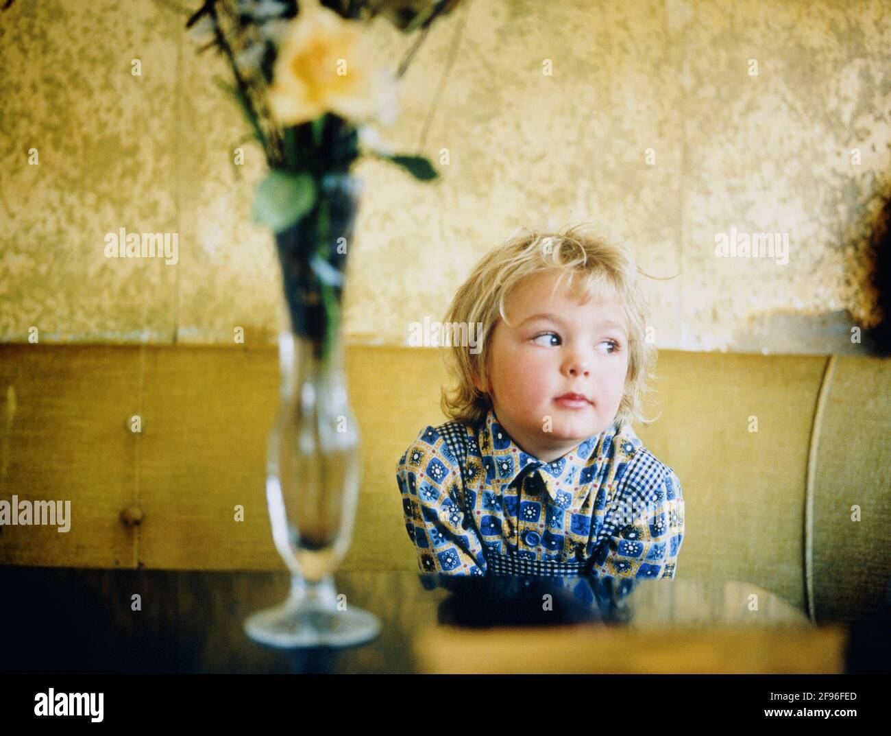 Boy sitting on table in hi-res stock photography and images - Alamy
