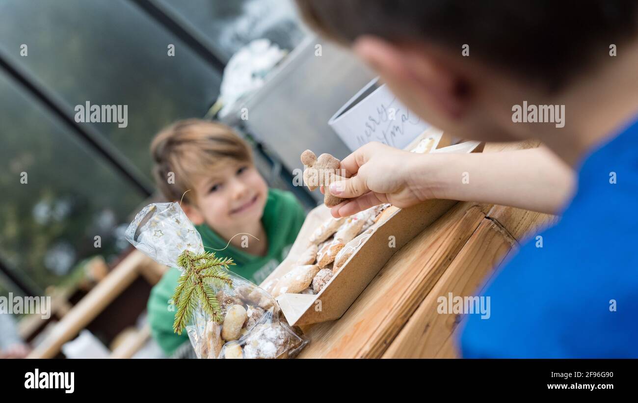 Children baking at Christmas time, children's bakery Stock Photo
