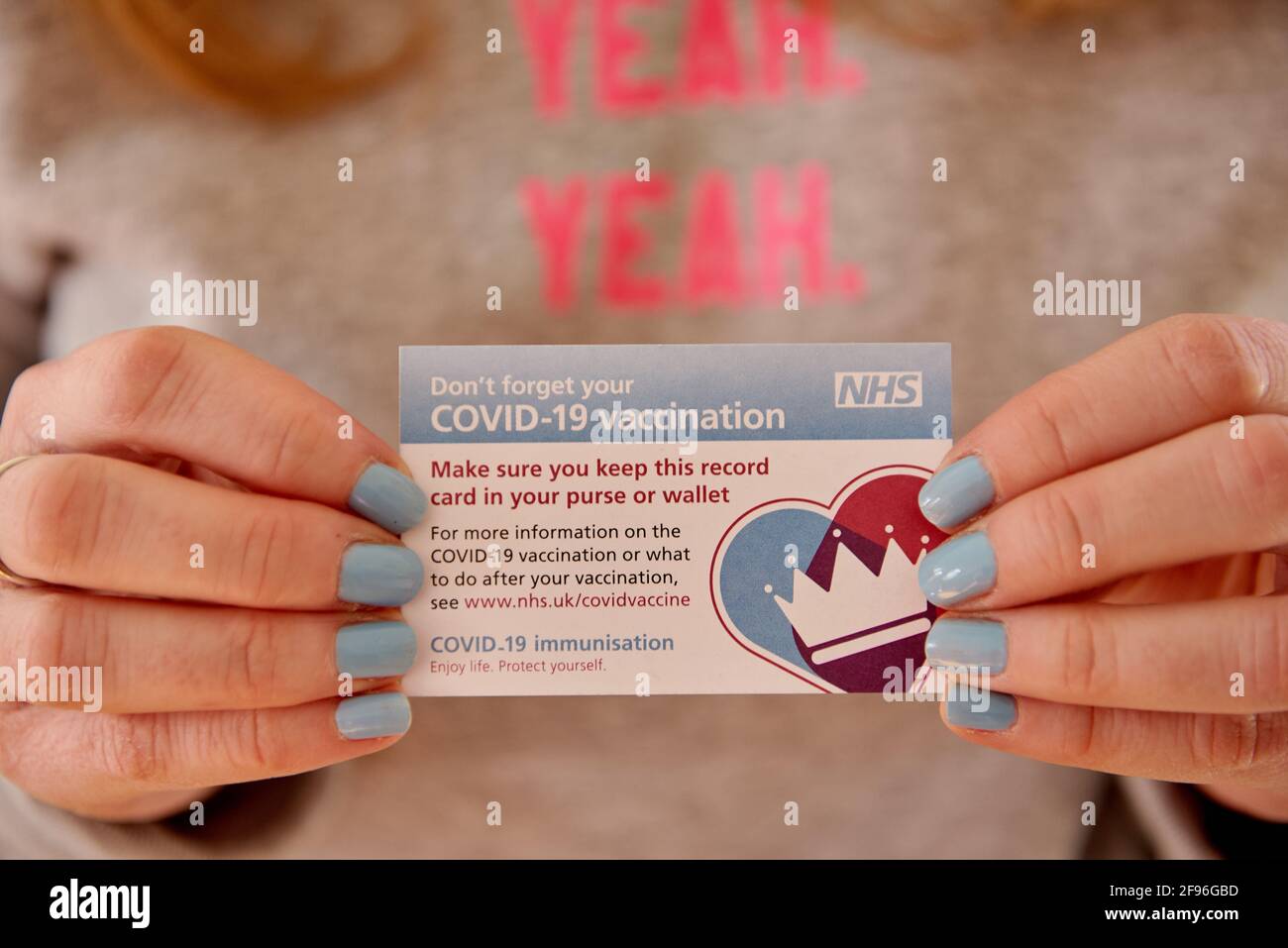 NHS Covid-19 vaccination card. UK. Close up. Stock Photo