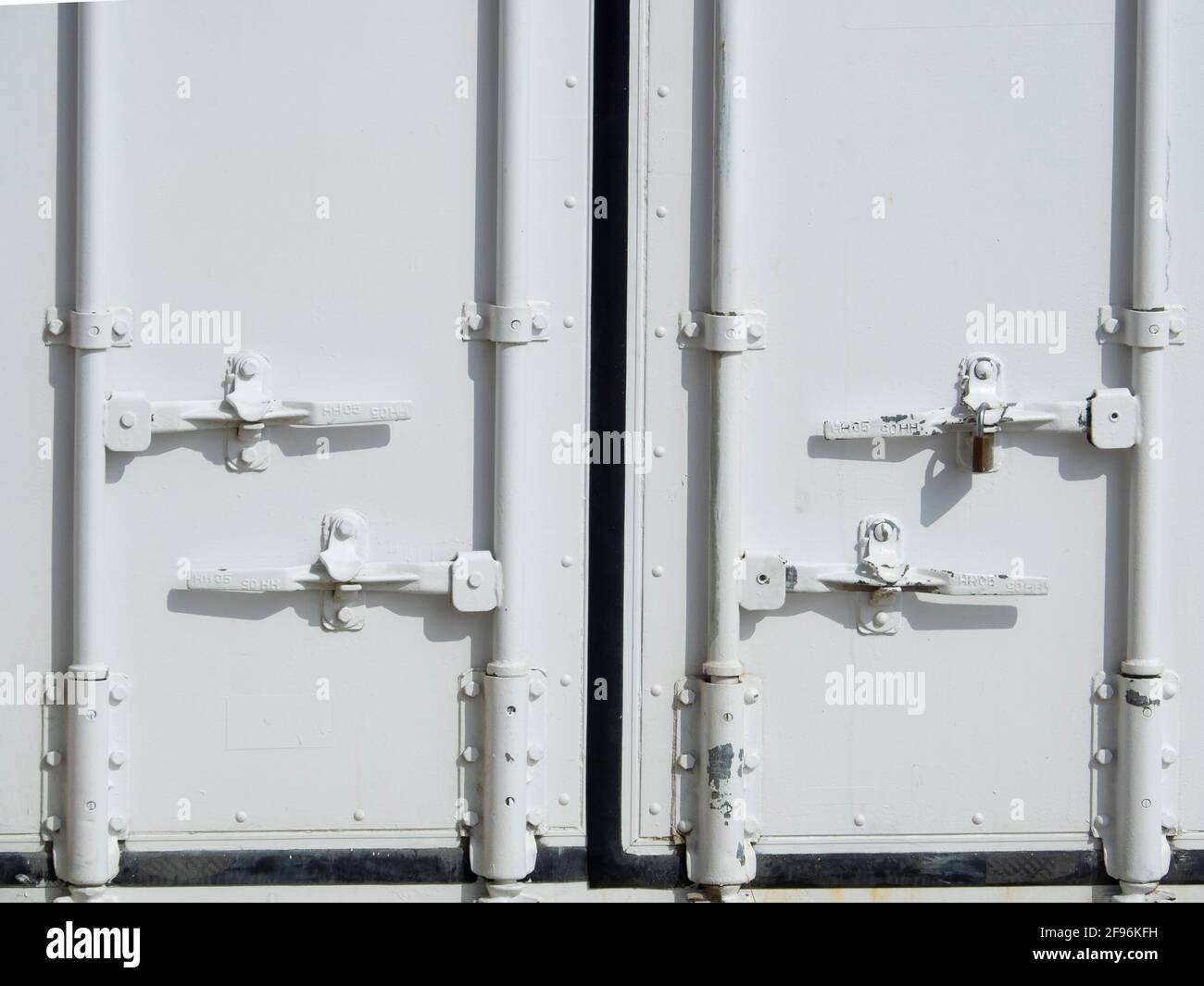 White doors of a closed shipping container Stock Photo