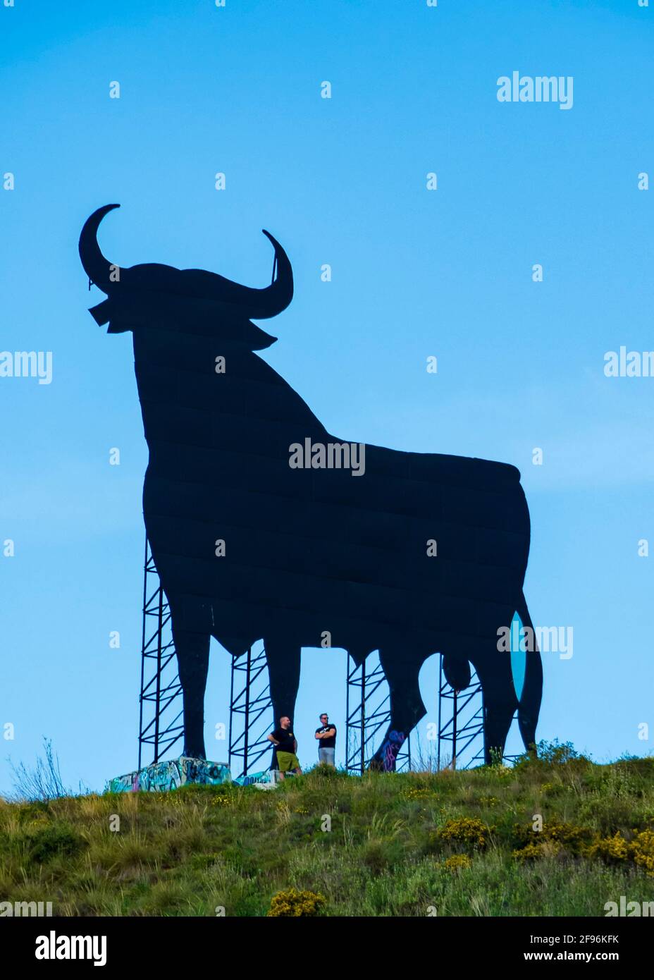 Large billboard with the silhouette of a bull, 'Toro de Osborne', on top of a mountain in Fuengirola. Stock Photo