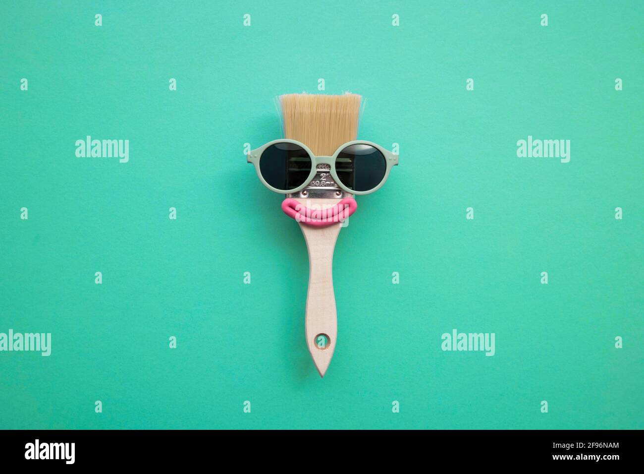 Paint brush diy character with sunglasses and smile Stock Photo