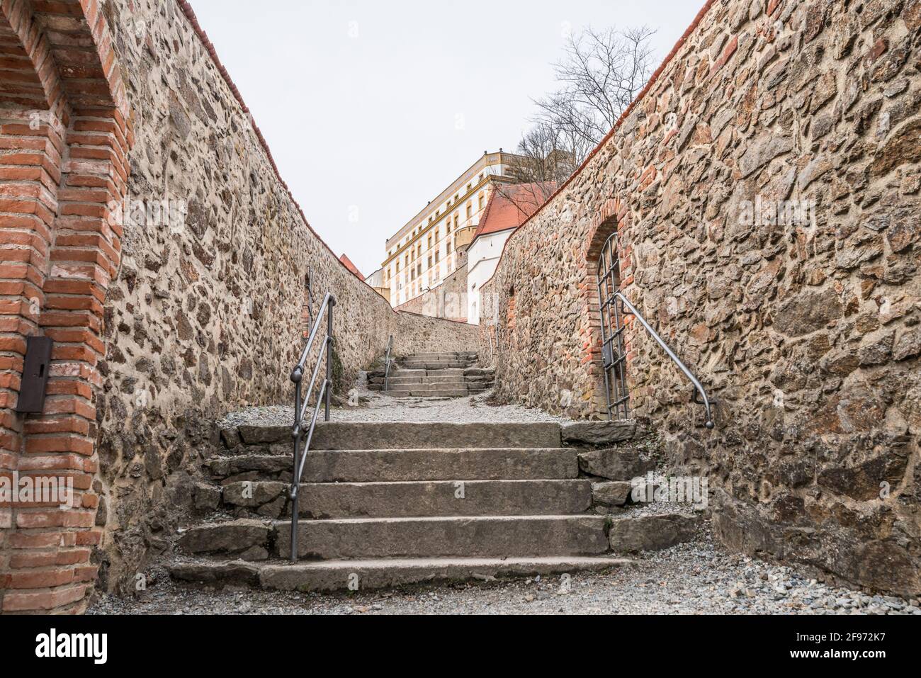 Detail of the defence system with a large watchtower and in the castle wall with embrasures of the fortress Feste Oberhaus near the three rivers city Stock Photo