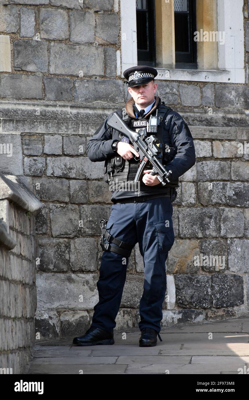 Windsor, UK, 16 April 2020 Armed police at Windsor Castle. St George's Chapel protected ahead of preparations for funeral. Windsor castle busy with tourists as well as preparations for Prince Phillip, the Duke of Edinburgh funeral. Credit: JOHNNY ARMSTEAD/Alamy Live News Stock Photo