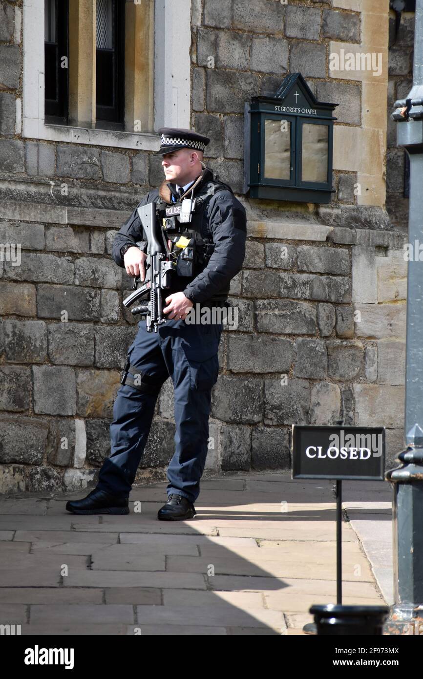 Windsor, UK, 16 April 2020 Armed police at Windsor Castle. St George's Chapel protected ahead of preparations for funeral. Windsor castle busy with tourists as well as preparations for Prince Phillip, the Duke of Edinburgh funeral. Credit: JOHNNY ARMSTEAD/Alamy Live News Stock Photo