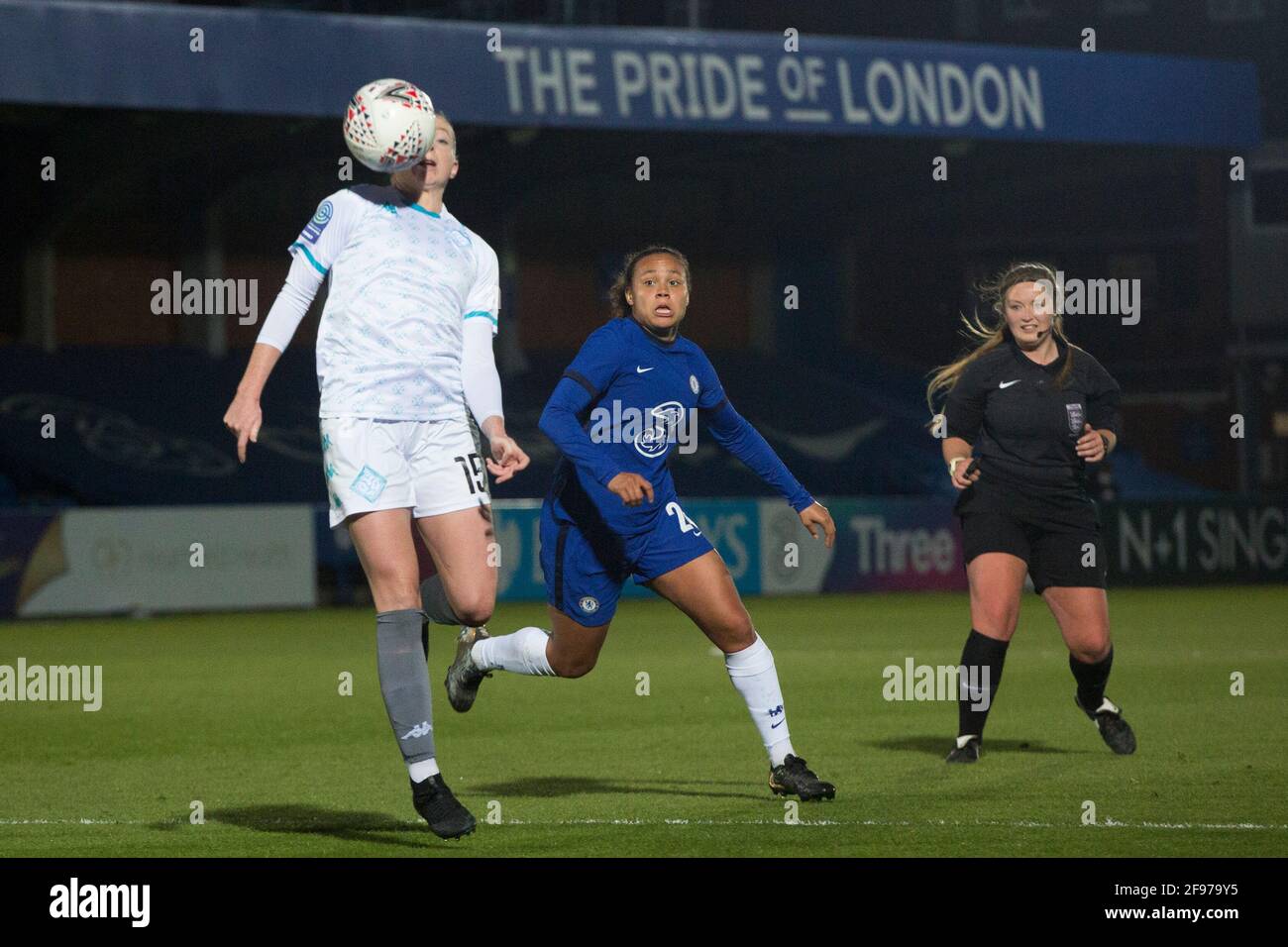 LONDON, UK. APRIL 16TH : London City controls the ball during the 2020-21 FA Women’s Cup fixture between Chelsea FC and London City at Kingsmeadow. Stock Photo