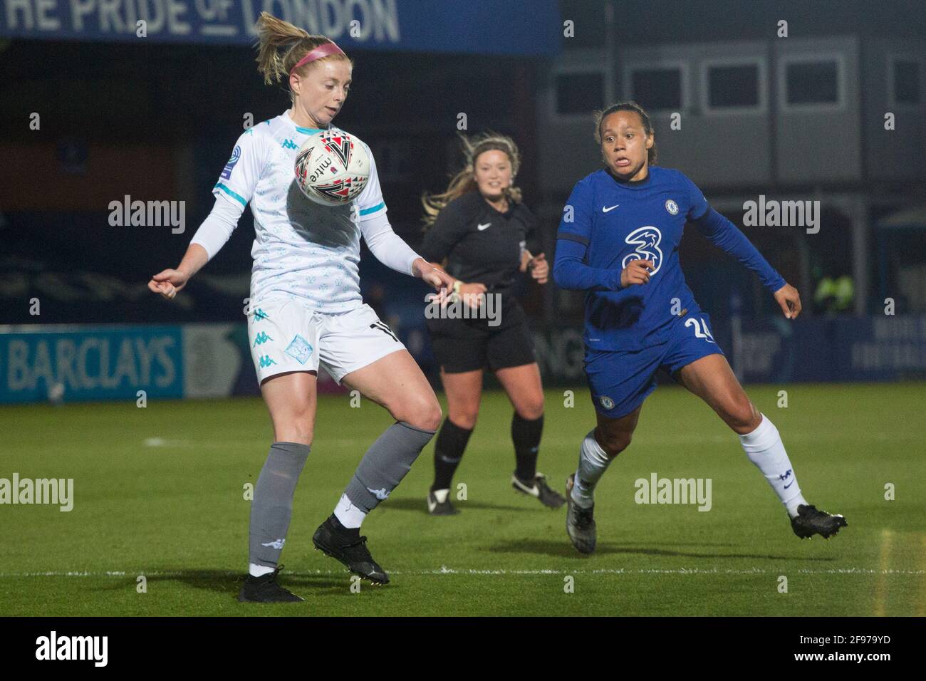 LONDON, UK. APRIL 16TH : London City controls the ball during the 2020-21 FA Women’s Cup fixture between Chelsea FC and London City at Kingsmeadow. Stock Photo