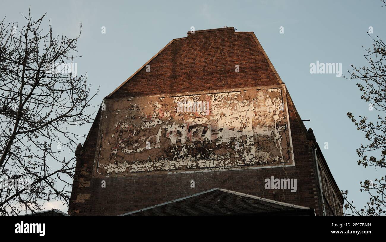 Red Hackle sign, Otago Street. Glasgow Scotland. Whisky advert 'ghost' sign Stock Photo