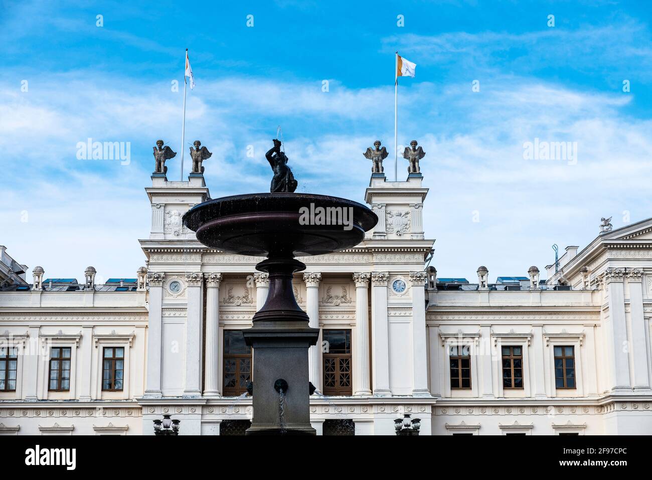 Fountain and the classic facade of the main buiding of the Lund