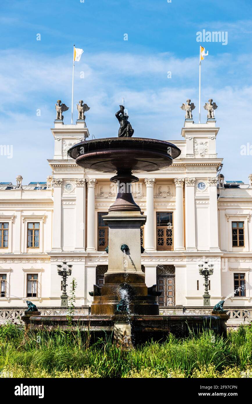 Fountain and the classic facade of the main buiding of the Lund