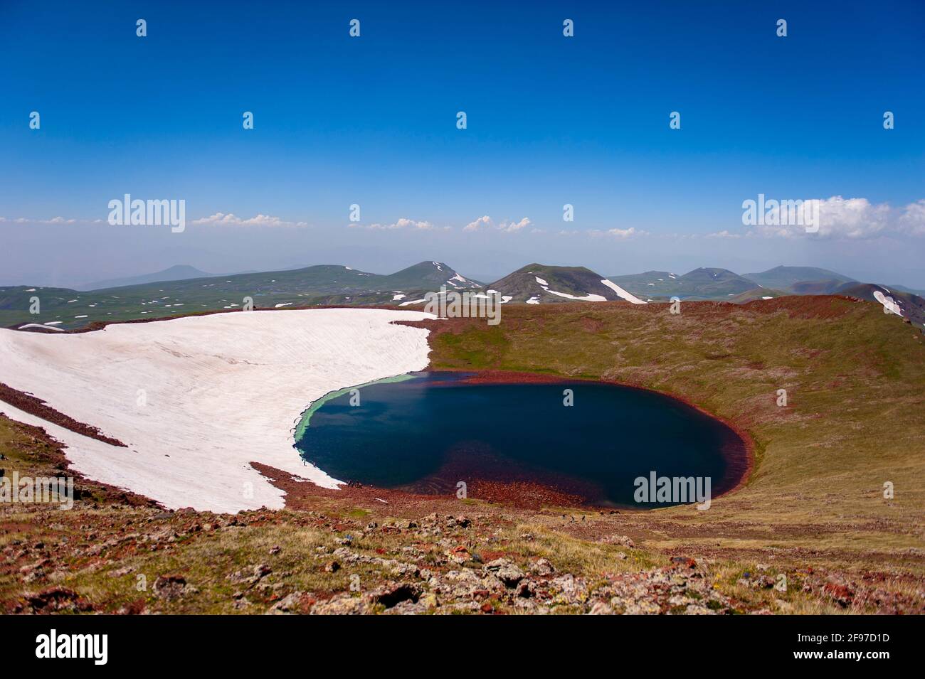 A beautiful crater lake on the summit of mount Azhdahak in Armenia Stock Photo