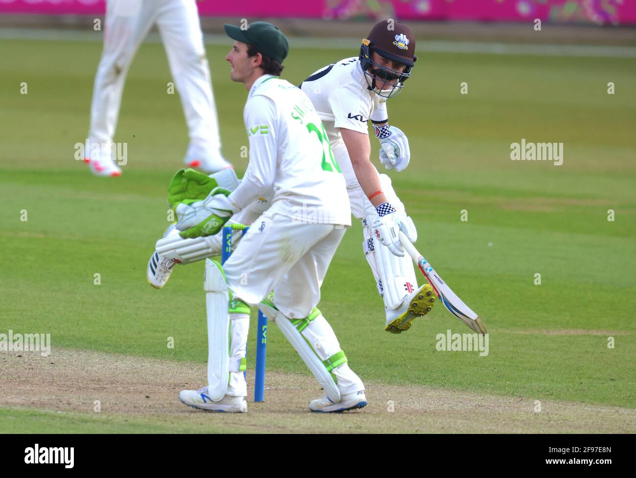 16 April, 2021. London, UK. Surrey’s Ollie Pope survives a quick single with a comedy moustache as Surrey take on Leicestershire in  the County Championship at the Kia Oval, day two. David Rowe/Alamy Live News Stock Photo