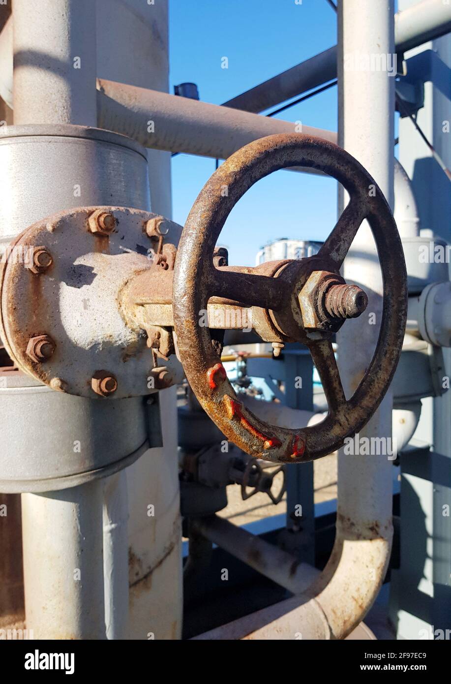 Closing or opening for gas or water supply through a pipeline. Shut-off valves on the pipeline close-up Stock Photo