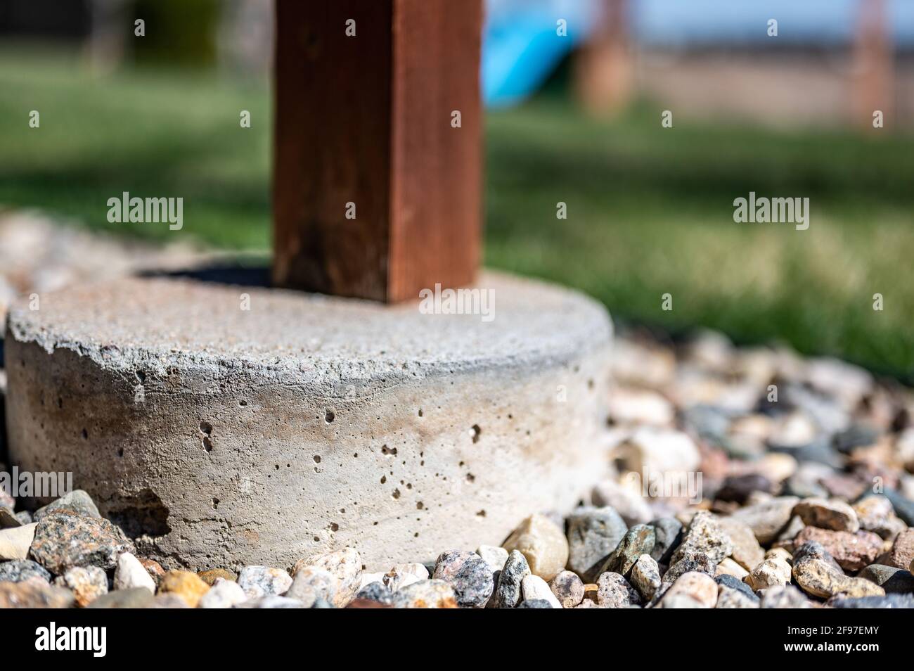 concrete tube footing used to transfer support from a suspended wooden