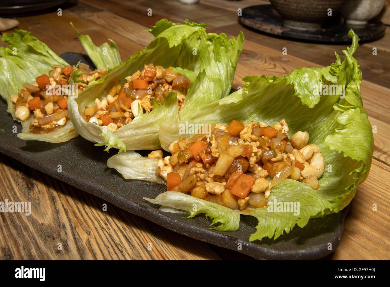 A delicious plate of Chicken Yuk Sung, Chinese Lettuce Wraps with cashew nuts , traditional meal in china Stock Photo