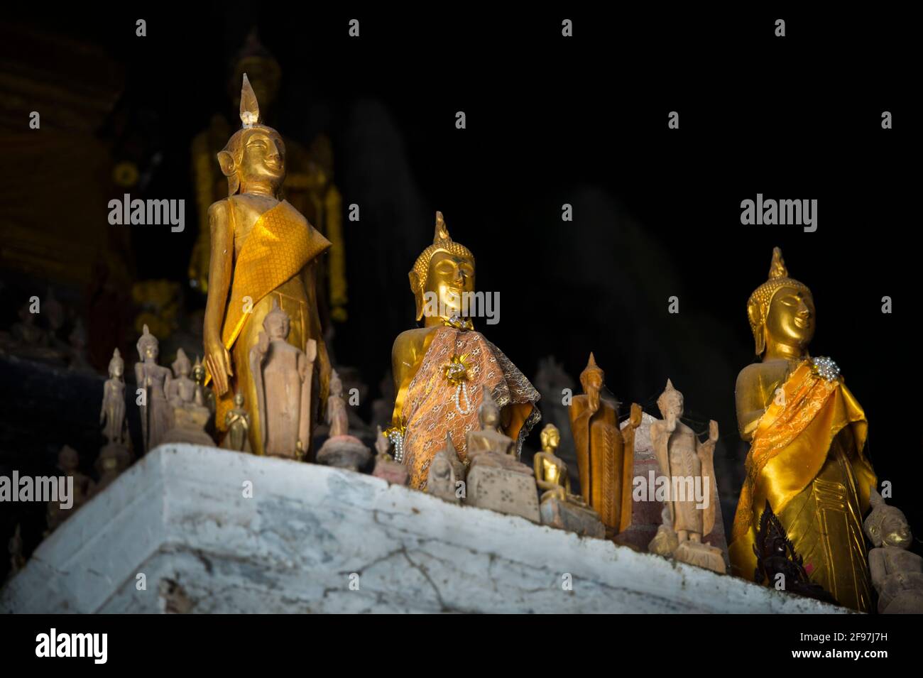 Laos, Pak Ou caves, Tham Ting, statues, Stock Photo