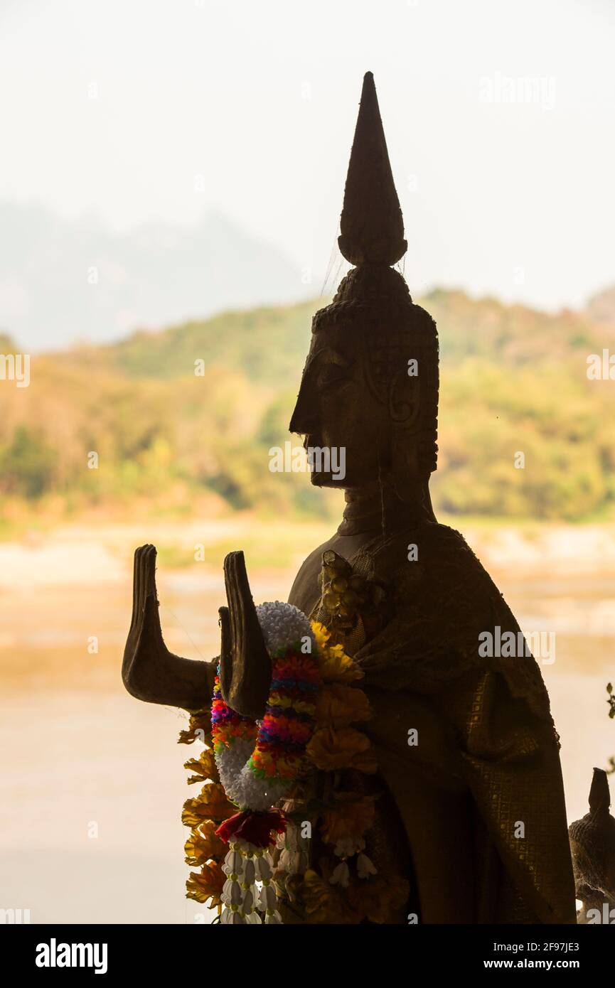 Laos, Pak Ou Caves, Tham Ting, statue, detail Stock Photo