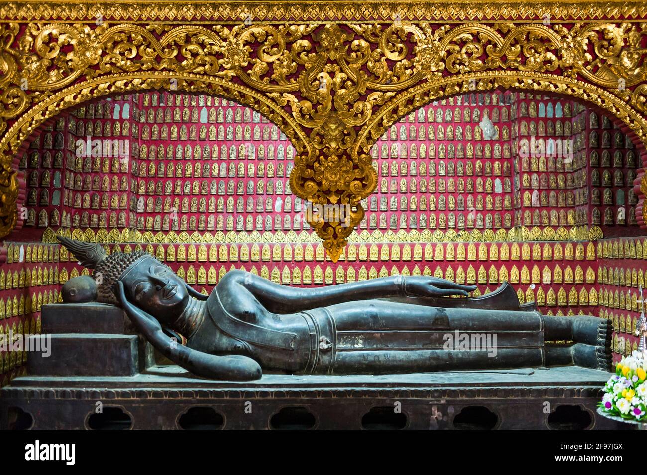 Laos, Luang Prabang, Vat Xieng Thong temple, the reclining Buddha symbolizes the dying Buddha Stock Photo