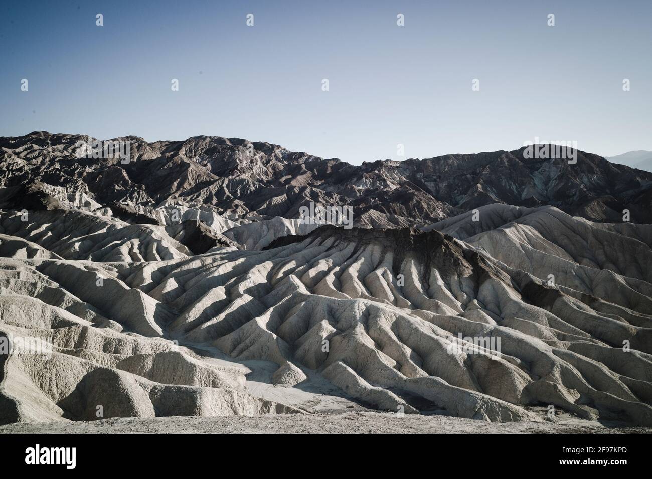 A picturesque desert-Scene with heavily eroded Ridges taken at the well-known Zabriskie Point, Death Valley National Park, California, USA Stock Photo