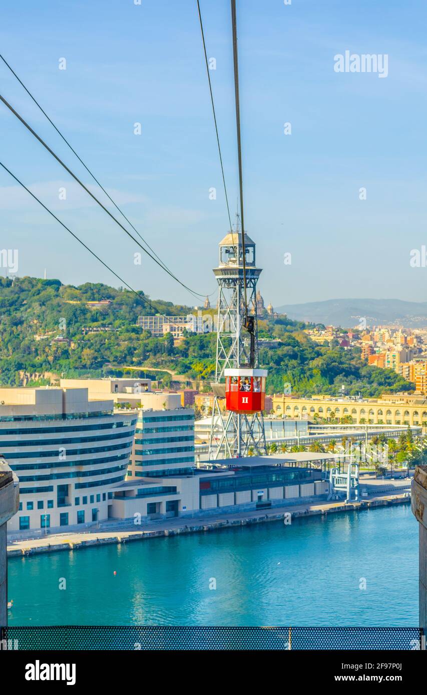 View of the cable car connecting barceloneta beach and montjuic hill in ...
