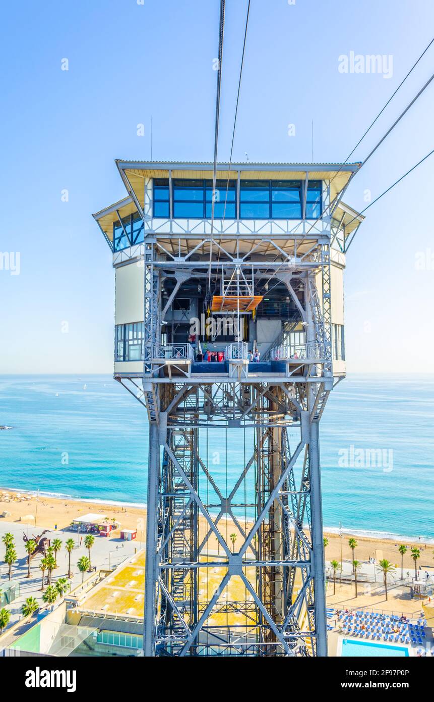 View of the cable car connecting barceloneta beach and montjuic hill in ...