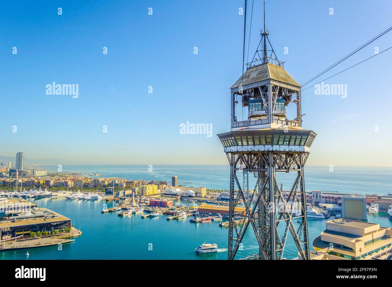View of the cable car connecting barceloneta beach and montjuic hill in ...
