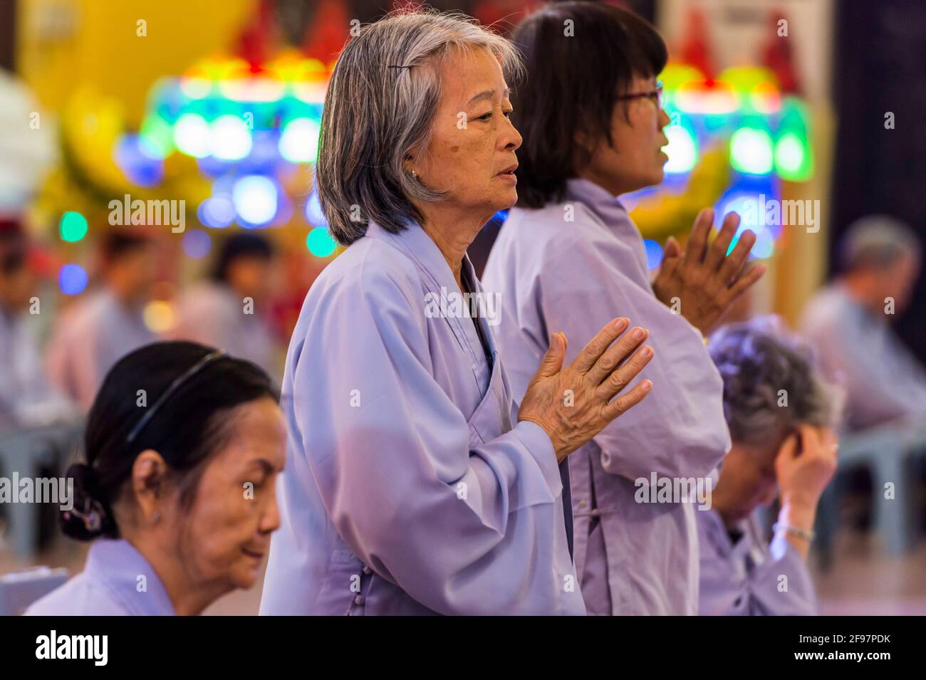 Vietnam, Ho Chi Minh City, Chua Giac Lam Pagoda with the Vai Duoc Su (Medicine Buddha) ceremony, women, prayer, Stock Photo