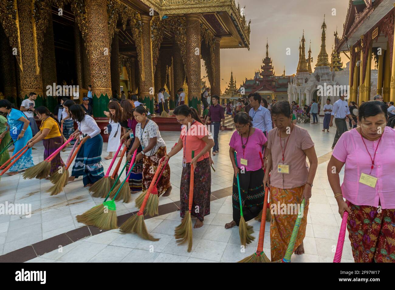 Myanmar, Yangon, the Shwedagon Pagoda, women, brooms, sweep, Stock Photo