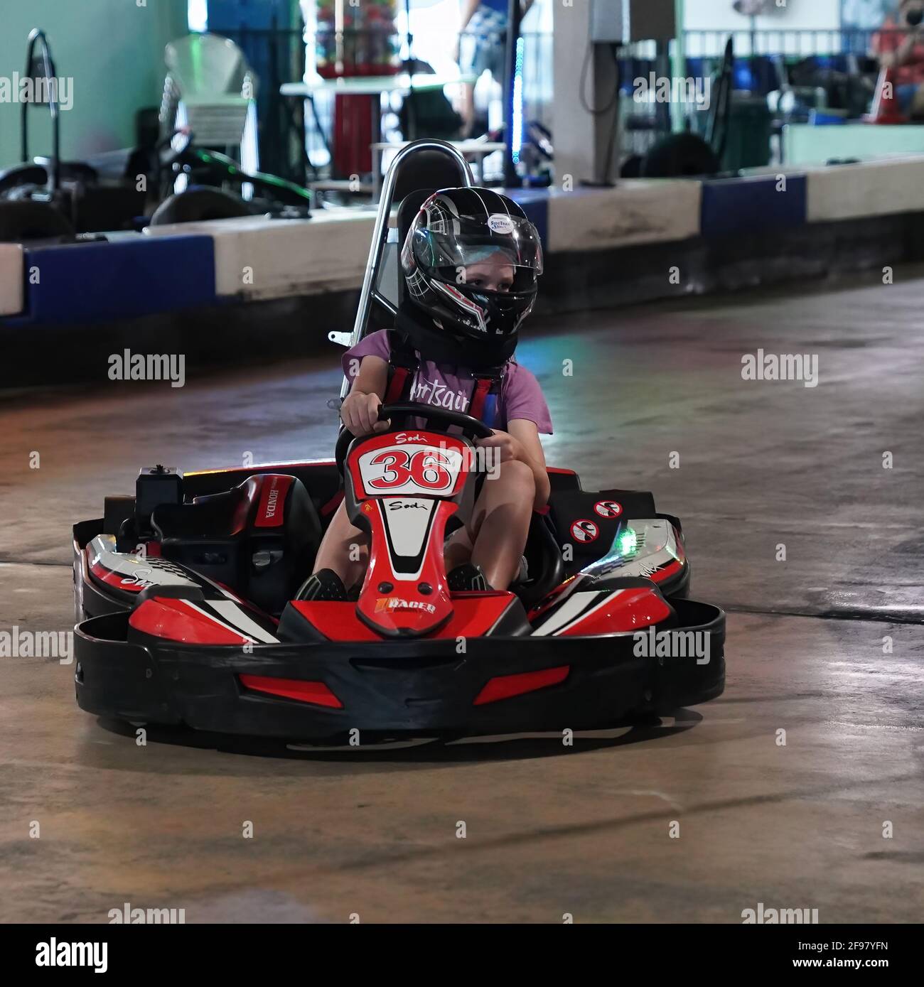 Mackay, Queensland, Australia April 2021 A young girl drives a go