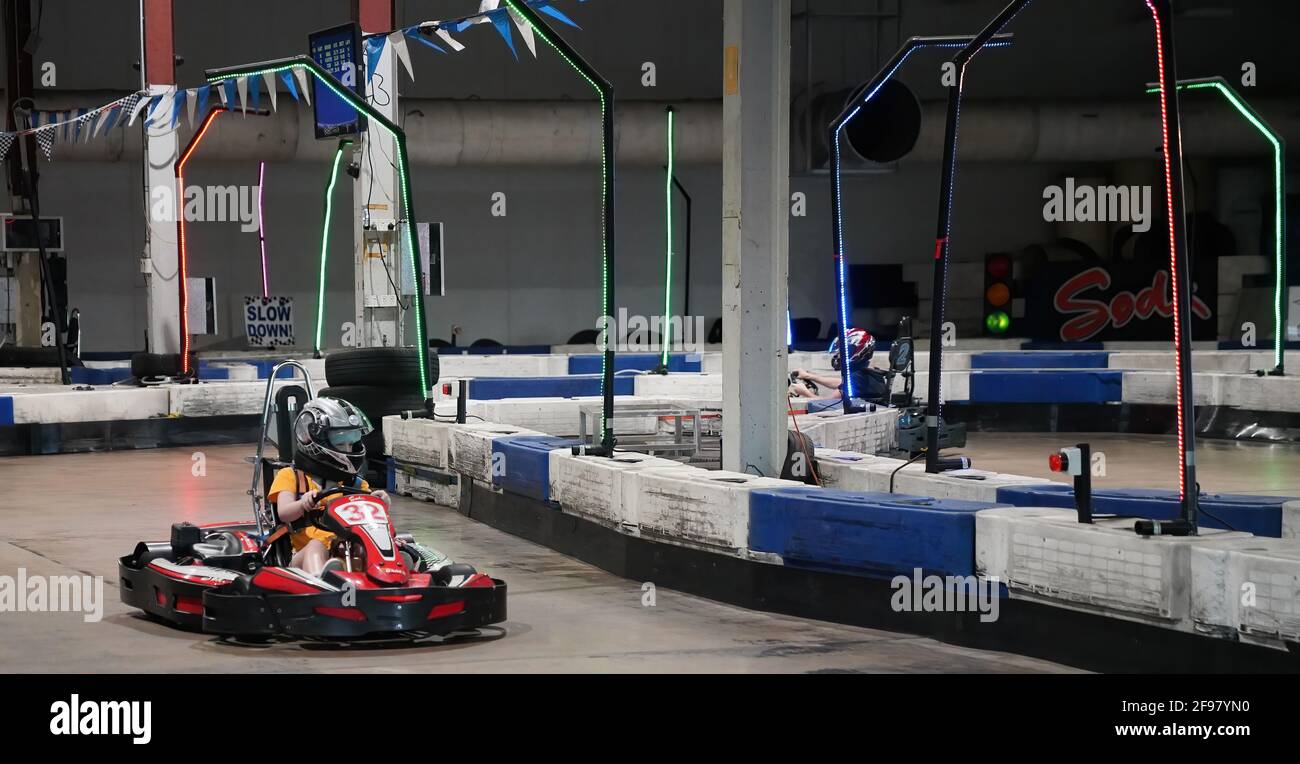 Mackay, Queensland, Australia April 2021 A young girl drives a go