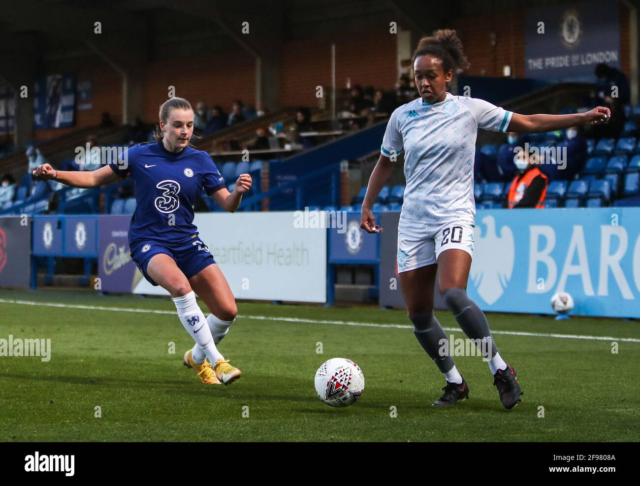 Chelsea's Jorja Fox (left) and London City Lionesses' Atlanta Primus (right) battle for the ball during the Vitality Women's FA Cup fourth round match at Kingsmeadow Stadium, London. Stock Photo