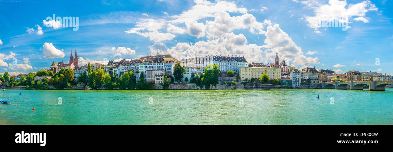 Riverside of Rhine in Basel dominated by majestic building of Munster ...