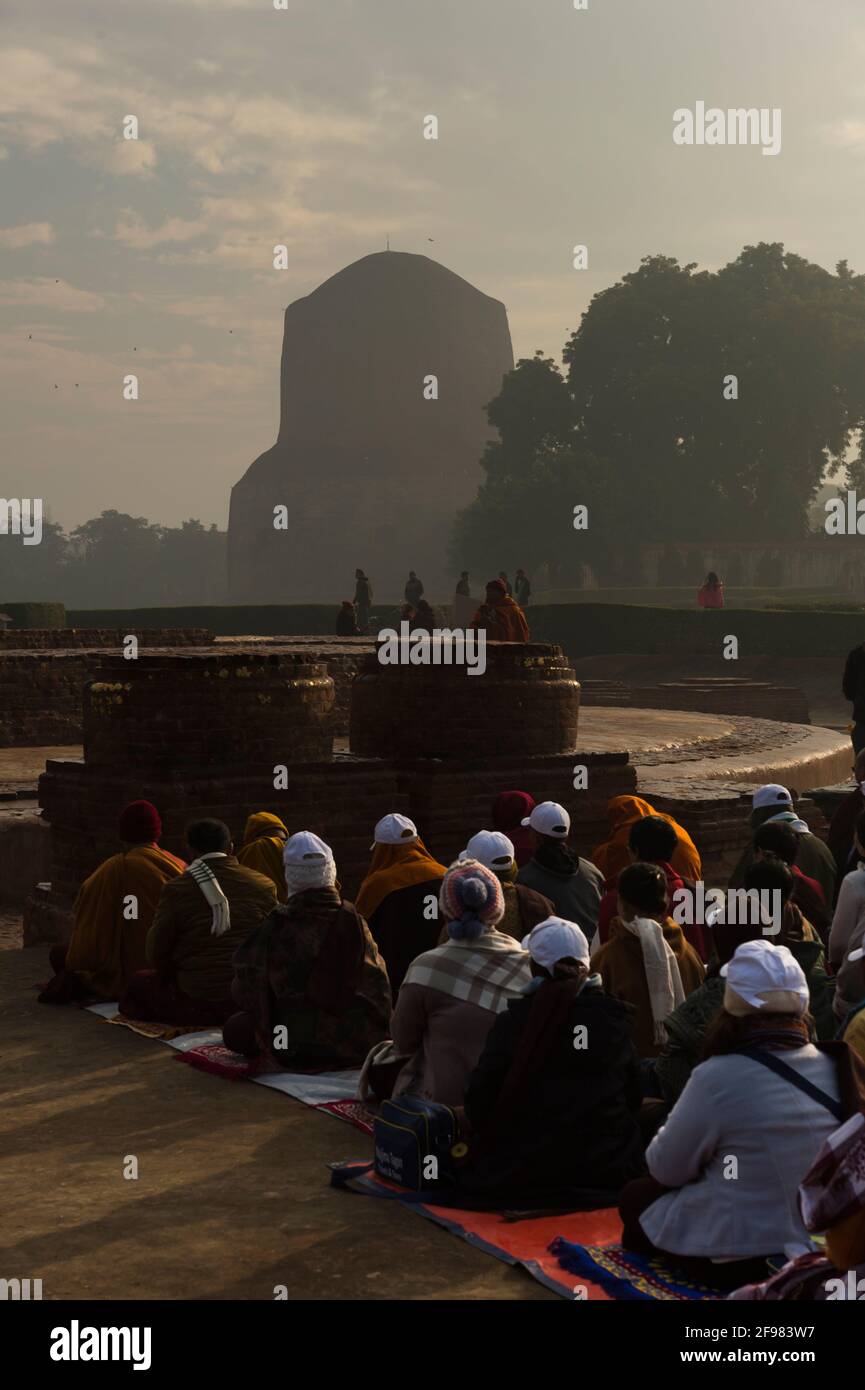 India, Sarnath, Dhamekh Stupa, believers, prayer, Stock Photo