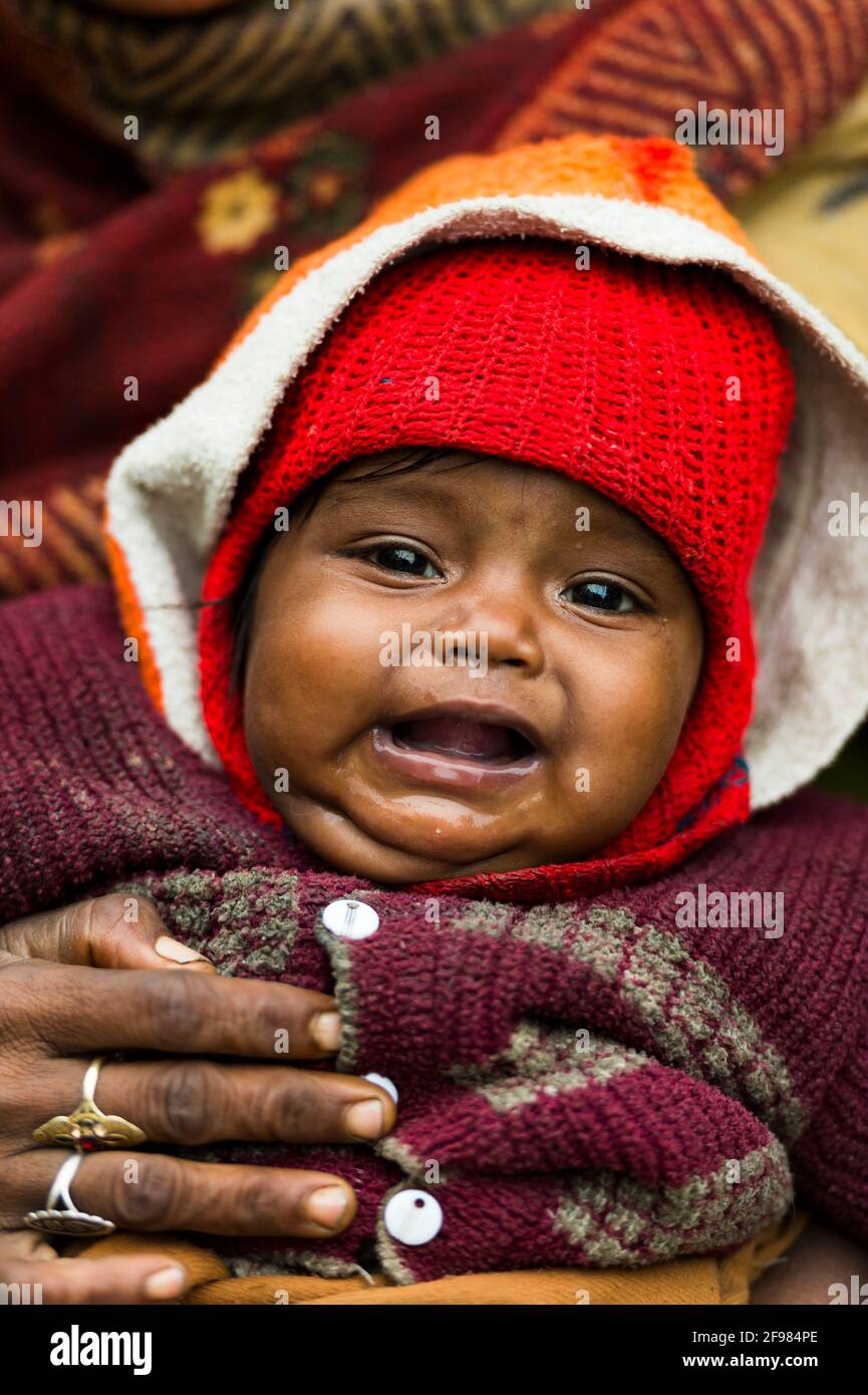 India, Varanasi, in the old town, baby, cap, portrait, Stock Photo