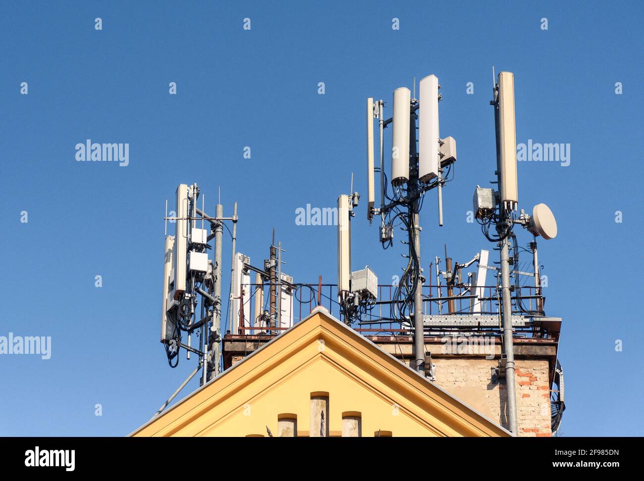 Shot of antennas on the building rooftop Stock Photo Alamy