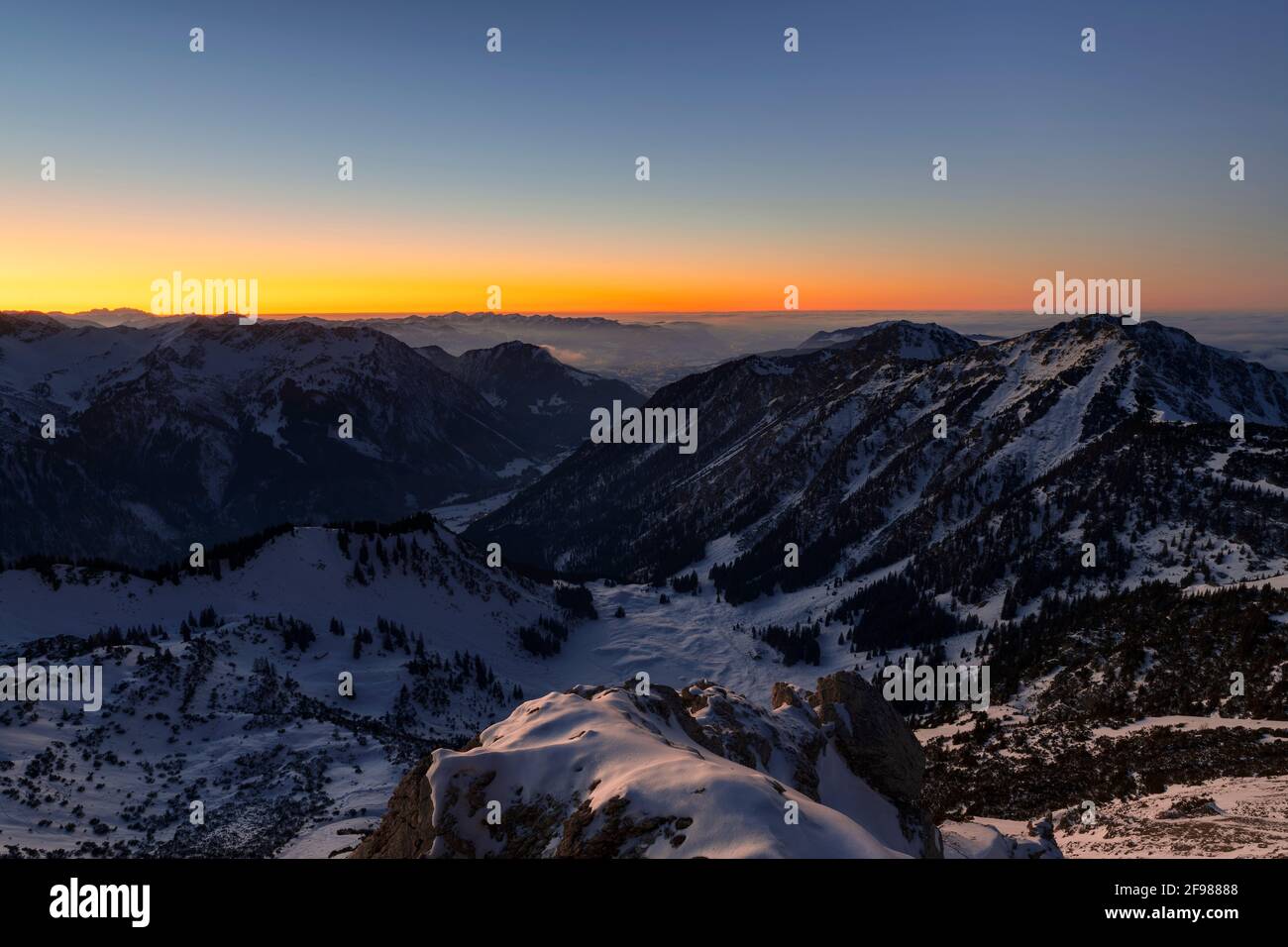Sunset at the summit of the Gaishorn near Hinterstein on a cold winter day. Allgäu Alps, Bavaria, Germany Stock Photo