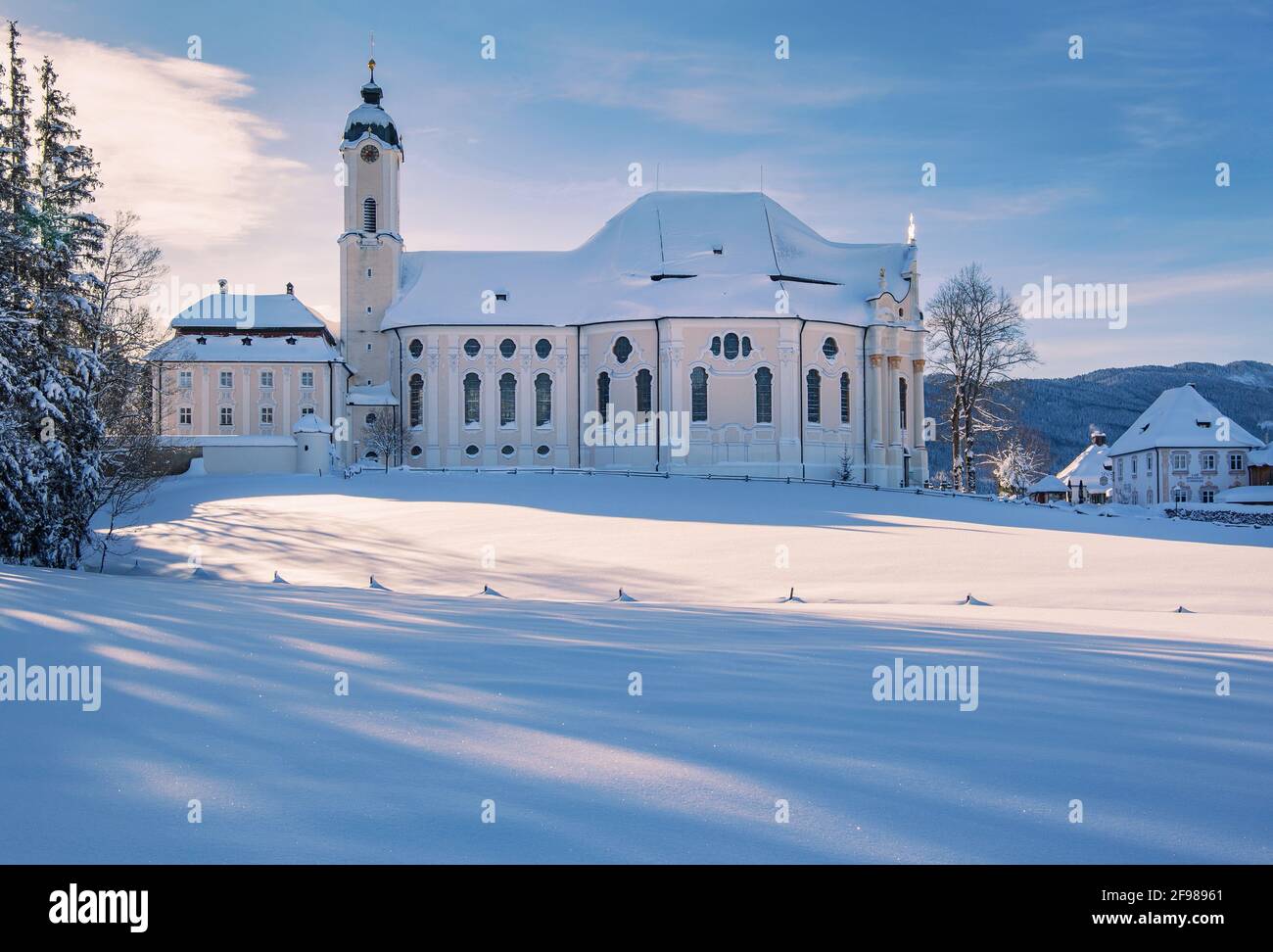 Winter landscape with the pilgrimage church Wieskirche in the district of Wies, Steingaden, Pfaffenwinkel, Romantische Strasse, Upper Bavaria, Bavaria, Germany Stock Photo