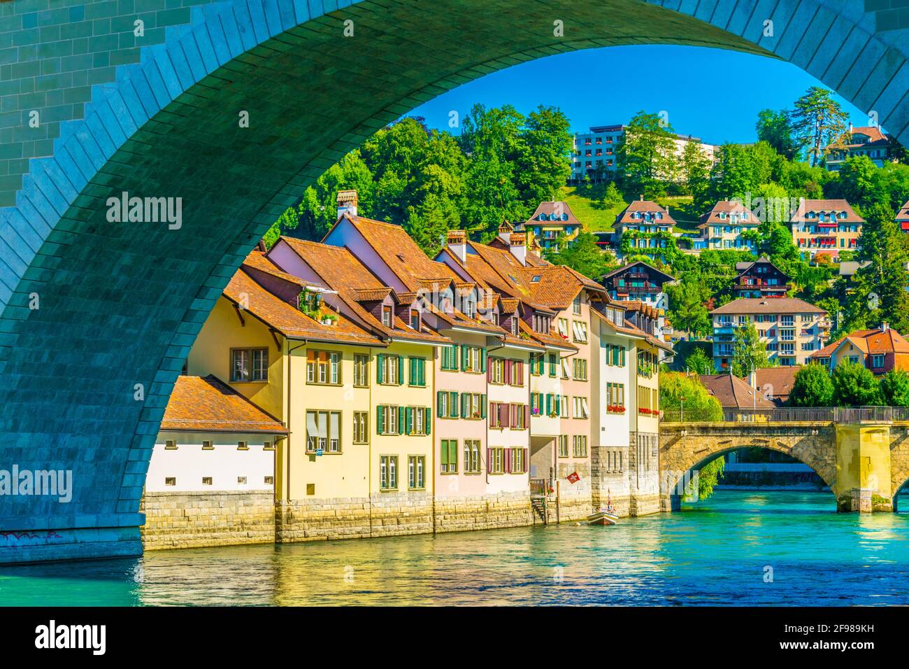 Traditional houses in Bern mirroring in Aare river, Switzerland Stock